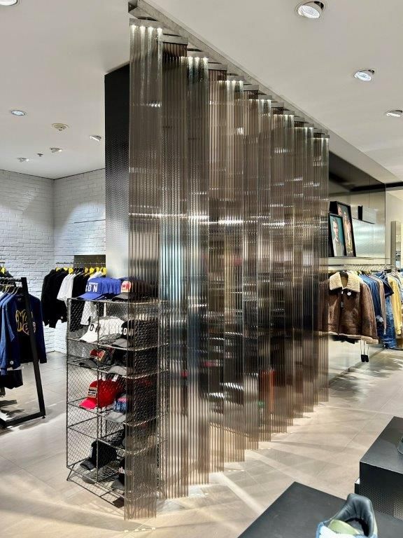 BVH-Firma Kastner & Öhler Graz - Shop Trennwand - Produkt PC-Stegplatte 10 mm Bronce